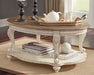 Realyn Coffee Table with 1 End Table Royal Furniture