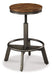 Torjin Counter Height Dining Table and 4 Barstools Royal Furniture