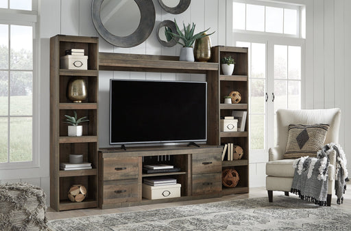 Trinell 4-Piece Entertainment Center Royal Furniture