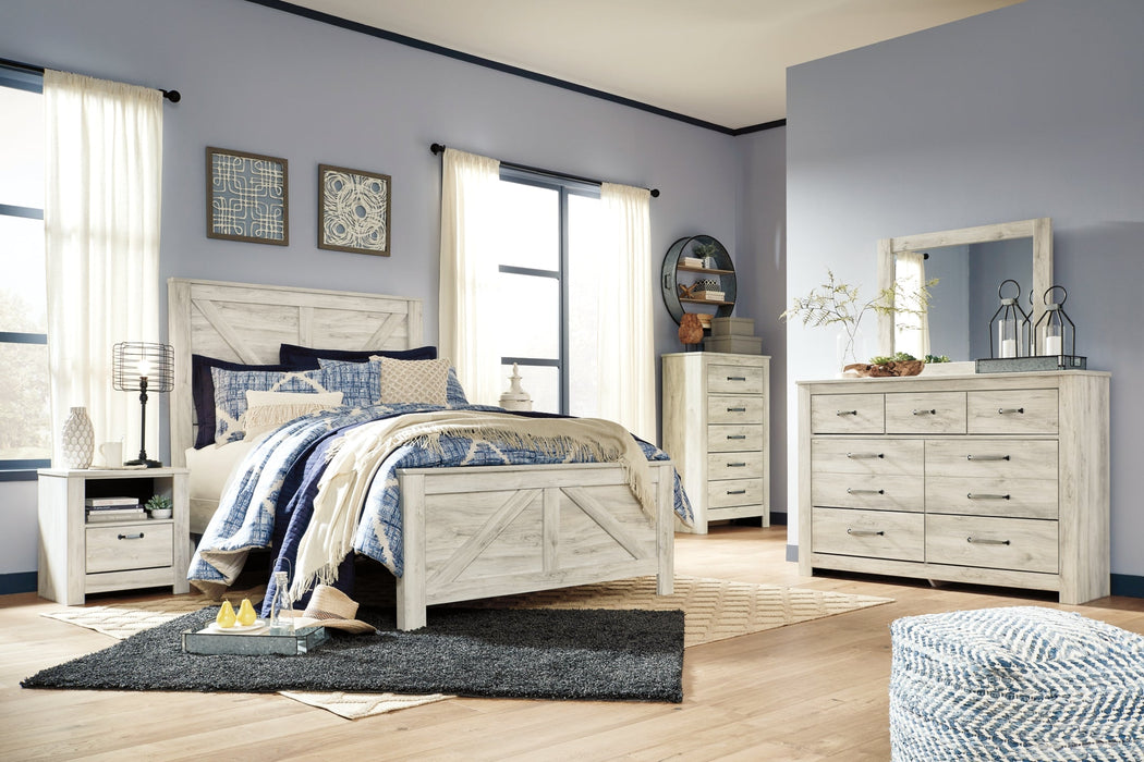 Bellaby Queen Crossbuck Panel Bed with Mirrored Dresser, Chest and 2 Nightstands Royal Furniture