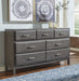 Caitbrook Queen Storage Bed with 8 Drawers with Dresser and Chest Royal Furniture