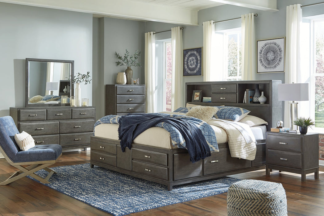 Caitbrook Queen Storage Bed with 8 Storage Drawers with Mirrored Dresser, Chest and Nightstand Royal Furniture