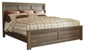 Juararo King Panel Bed with Mirrored Dresser Royal Furniture