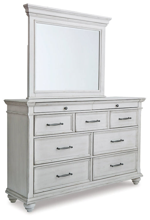 Kanwyn King Panel Bed with Mirrored Dresser Royal Furniture