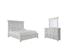 Kanwyn Queen Panel Bed with Mirrored Dresser Royal Furniture