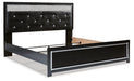 Kaydell King Upholstered Panel Bed with Mirrored Dresser Royal Furniture