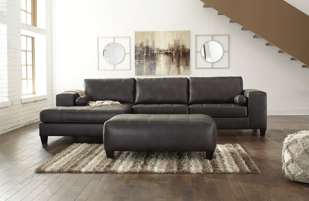 Nokomis 2-Piece Sectional with Ottoman Royal Furniture